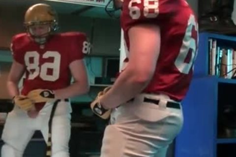 sleazy pecker stroking in football gear